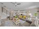 Comfortable living room area with neutral tones, stylish furniture, and abundant natural light at 3442 Chestertown Loop, Bradenton, FL 34211