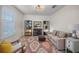 Comfortable office space with desk, shelving and a modern light fixture at 3442 Chestertown Loop, Bradenton, FL 34211
