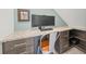 Office space featuring a dark-stained built in desk and shelving at 3442 Chestertown Loop, Bradenton, FL 34211