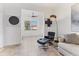 Comfortable sitting area with modern chair, view to outside, and stylish design elements at 3701 54Th W Dr # 103, Bradenton, FL 34210
