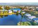 Scenic aerial view of the community showcasing waterfront homes, mature trees, and serene landscaping at 3912 14Th E St, Ellenton, FL 34222