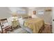 Comfortable bedroom with plantation shutters and wood flooring at 3912 14Th E St, Ellenton, FL 34222