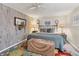 Charming bedroom with a metal bed frame, decorative accents and a cozy atmosphere at 3912 14Th E St, Ellenton, FL 34222