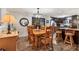Dining room featuring wooden table and chairs with the kitchen in the background at 3912 14Th E St, Ellenton, FL 34222