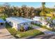 Charming single-story home with a well-maintained lawn and river in the background at 3912 14Th E St, Ellenton, FL 34222