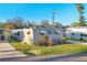 Well-maintained single-story home with a lovely front yard and manicured bushes at 3912 14Th E St, Ellenton, FL 34222