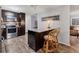 Modern kitchen with stainless steel appliances and bar seating at 3912 14Th E St, Ellenton, FL 34222
