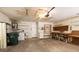 Functional garage offering a washer, dryer, workbench, and ample storage space for various needs at 4018 Oakhurst Dr # 3181, Sarasota, FL 34233
