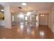 Spacious living room features tile flooring, natural lighting, and large mirror at 4018 Oakhurst Dr # 3181, Sarasota, FL 34233
