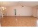 Open living area with tile flooring, ceiling fan, and chandelier light fixture at 4018 Oakhurst Dr # 3181, Sarasota, FL 34233