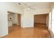 Open living area with tile floors, ceiling fan, and easy access to other rooms at 4018 Oakhurst Dr # 3181, Sarasota, FL 34233