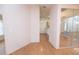 Open living space features tile flooring and light walls with openings to other rooms at 4018 Oakhurst Dr # 3181, Sarasota, FL 34233
