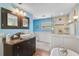 Elegant bathroom with a vessel sink, standalone shower, and stylish dark wood cabinets at 4116 34Th E Ave, Bradenton, FL 34208