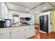 Bright kitchen with stainless steel appliances, ample counter space, and stylish cabinetry at 4116 34Th E Ave, Bradenton, FL 34208