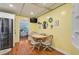 Eat-in kitchen with stainless steel appliances, breakfast table, and decorative wall accents at 4116 34Th E Ave, Bradenton, FL 34208
