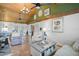 Spacious living room featuring tile floors, vaulted ceilings, and lots of room to move around at 4116 34Th E Ave, Bradenton, FL 34208