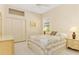 Bedroom featuring a closet, a window and a dresser at 4173 Hearthstone Dr, Sarasota, FL 34238