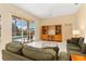 Comfortable living room with access to the pool, providing an indoor-outdoor living experience at 4173 Hearthstone Dr, Sarasota, FL 34238