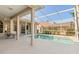 Inviting screened-in pool area with a lush landscaped backyard at 4173 Hearthstone Dr, Sarasota, FL 34238