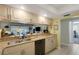 Bright kitchen with granite countertops and stainless appliances at 4348 Bowling Green Cir # 9, Sarasota, FL 34233