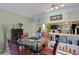 Living room with tile floors, wet bar and plenty of seating at 4348 Bowling Green Cir # 9, Sarasota, FL 34233