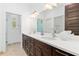 Elegant bathroom featuring a double sink vanity with modern fixtures and ample counter space at 4540 Murdock Ave, Sarasota, FL 34231