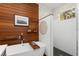 Bathroom featuring a soaking tub and tiled shower at 4540 Murdock Ave, Sarasota, FL 34231
