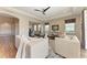 Open-concept living room with neutral colors, and seamless flow to other areas at 4789 Vasca Dr, Sarasota, FL 34240