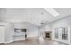Bright living room with a vaulted ceiling, fireplace, and lots of natural light at 5047 82Nd E Way, Sarasota, FL 34243
