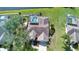 Aerial view of home and community with a screened in pool at 5110 76Th E St, Bradenton, FL 34203