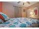 This charming bedroom features a bright coastal theme and comfortable furnishings at 5110 76Th E St, Bradenton, FL 34203