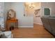 View of foyer featuring decorative front door, chandelier, and small wooden table at 5110 76Th E St, Bradenton, FL 34203
