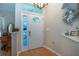 Bright and inviting foyer featuring hardwood floors and decorative accents at 5110 76Th E St, Bradenton, FL 34203