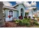 Well-maintained yard and lush landscaping around home's entrance at 5110 76Th E St, Bradenton, FL 34203