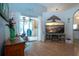 Bright living room featuring sliding glass doors to lanai and pool at 5110 76Th E St, Bradenton, FL 34203