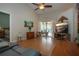 Spacious living room with ceiling fan, and sliding glass doors to lanai and pool at 5110 76Th E St, Bradenton, FL 34203