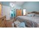 Comfortable main bedroom with en suite bathroom and plenty of natural light at 5110 76Th E St, Bradenton, FL 34203