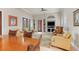 Comfortable clubhouse area with plenty of seating, a TV, and an EXIT to the outdoor patio at 5142 Cote Du Rhone Way, Sarasota, FL 34238