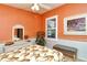 Comfortable bedroom featuring an accent wall, comfortable bed, and a picture window at 5250 Hyland Hills Ave # 1514, Sarasota, FL 34241