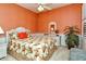 Charming bedroom featuring an accent wall, comfortable bed, and lots of natural light at 5250 Hyland Hills Ave # 1514, Sarasota, FL 34241