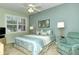 Relaxing bedroom with a comfortable bed, stylish linens, and lots of natural light at 5250 Hyland Hills Ave # 1514, Sarasota, FL 34241