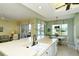 Kitchen island view showcases the sink, countertops and into the adjacent living room and breakfast nook at 5250 Hyland Hills Ave # 1514, Sarasota, FL 34241