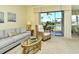 Open living room with water views and comfortable seating at 5250 Hyland Hills Ave # 1514, Sarasota, FL 34241