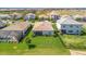 An aerial view of a well-maintained lawn, landscaping and outdoor living space at 5317 Coral Reef Way, Bradenton, FL 34211