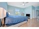 Relaxing bedroom features a comfortable bed, natural light, and modern amenities at 5317 Coral Reef Way, Bradenton, FL 34211