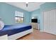 Bright bedroom offering natural light and a closet for storage, creating a comfortable and functional space at 5317 Coral Reef Way, Bradenton, FL 34211