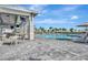 Beautiful community pool with lounge chairs and covered seating areas, perfect for a sunny day at 5317 Coral Reef Way, Bradenton, FL 34211