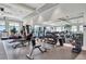 Well-lit gym with an array of weightlifting equipment and full mirrors to help elevate your workout experience at 5317 Coral Reef Way, Bradenton, FL 34211