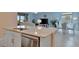 Kitchen features stainless appliances, granite countertops, and adjacent dining at 5317 Coral Reef Way, Bradenton, FL 34211