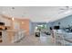 Bright open floor plan with eat-in kitchen, dining area, and living room at 5317 Coral Reef Way, Bradenton, FL 34211